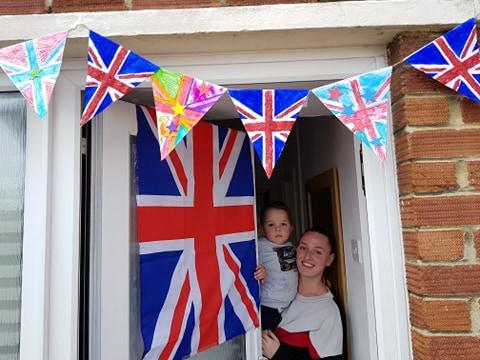Angel sky Anderson and her son Finley celebrate the anniversary of VE Day 75 at Cornwallis House in Portsmouth.