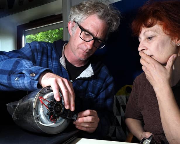 Repair Cafe at Heeley City Farm: Gareth Coleman helping Patri Loreto mend her kettle