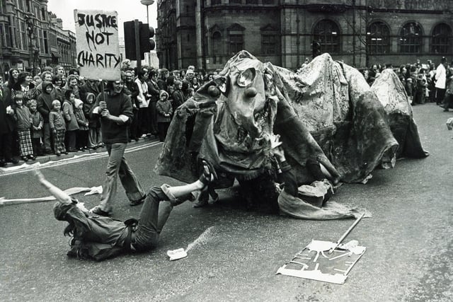 Part of the fearful battle which took place in front of the Town Hall between this monster and its attackers in the Sheffield University Rag Parade, October 26, 1974