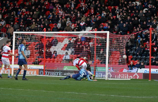 Kieran Sadlier scores his 12th goal of the season against Wycombe