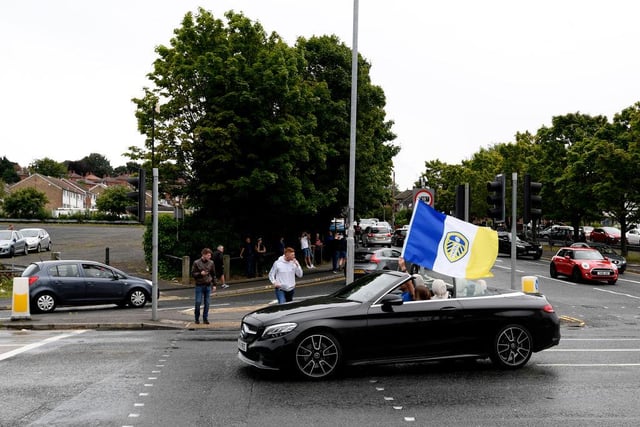 Fans also drove past in their cars - tooting their horns and sporting their colours proudly.