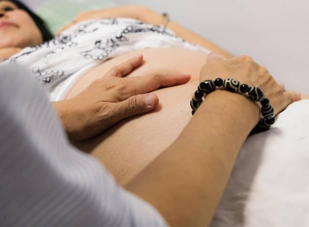 Woman receiving ultrasound scan. File photo by adobe stock.