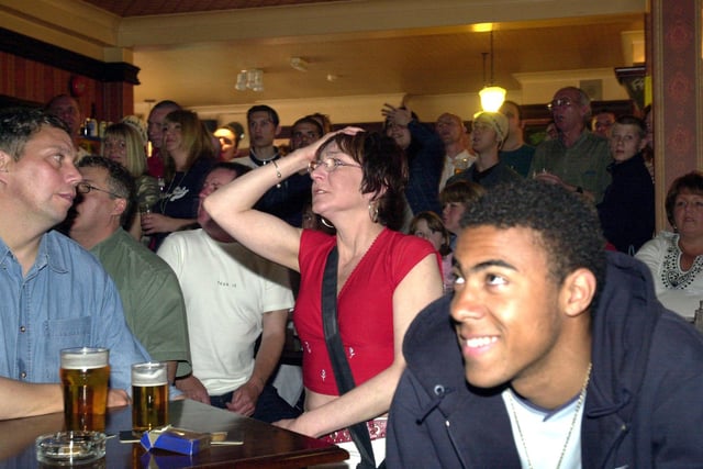 Blades fans watch United take on Wolves in the Division One play-off final on the big screen at the Ball Inn, Heeley, in May 2003.