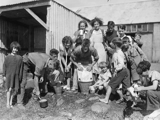Children and young people cleaning their dishes at Welton, Blairgowrie. Perth Museum and Art Gallery, D Wilson Laing Collection. Copyright Perth & Kinross Council.