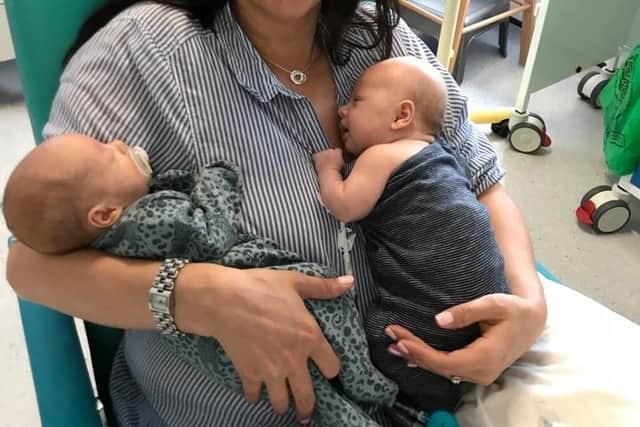 Mum, Anna Burgin, is taking on the three peaks challenge to raise money for Sheffield Children's Hospital. Pictured here with Brodie and his twin sister Renee.