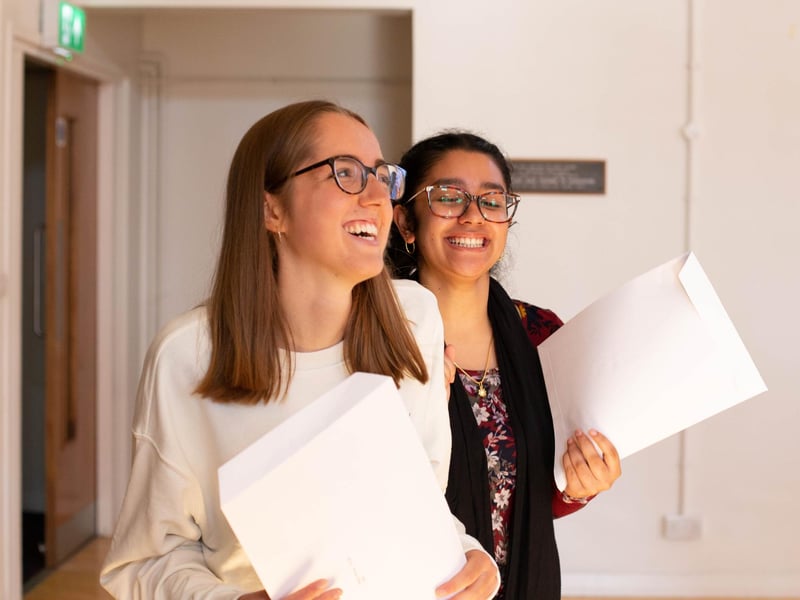 A-level results day at Portsmouth High School. Pictured: Friends happy with their results. Picture: Habibur Rahman
