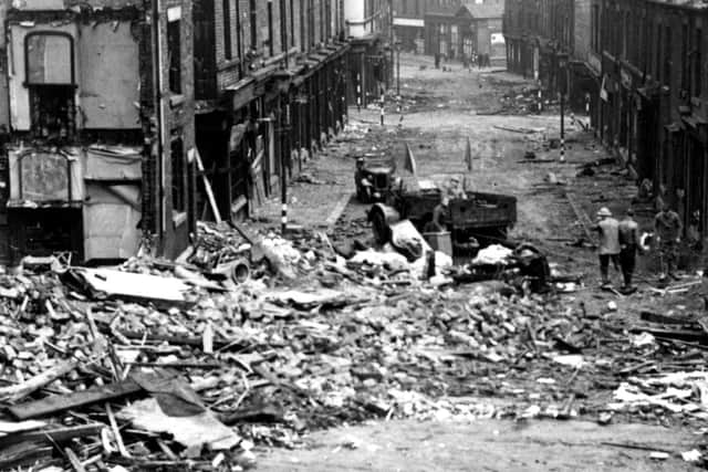 Unexploded bomb and bomb damage, adjacent to Rare and Racy on Devonshire Street, 12 Dec 1940. 
Pic: Picture Sheffield (Sheffield Local Studies Library): s01323