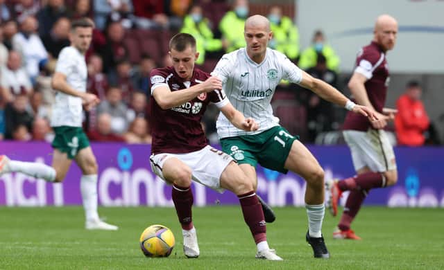 Hearts' Ben Woodburn challenges with Hibs' Alex Gogic during the goalless draw at Tynecastle (Photo by Alan Harvey / SNS Group)
