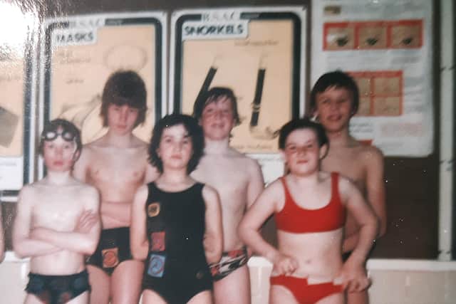 Justine Turner, pictured in red bikini at a Lady Mabel College 1978 sponsored swim in the pool at Wentworth Woodhouse. Her brother Gavin is pictured centre, back row.
