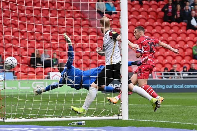 Tommy Rowe thinks he has given Rovers the lead only to see his goal chalked off for a foul. Picture: Howard Roe/AHPIX
