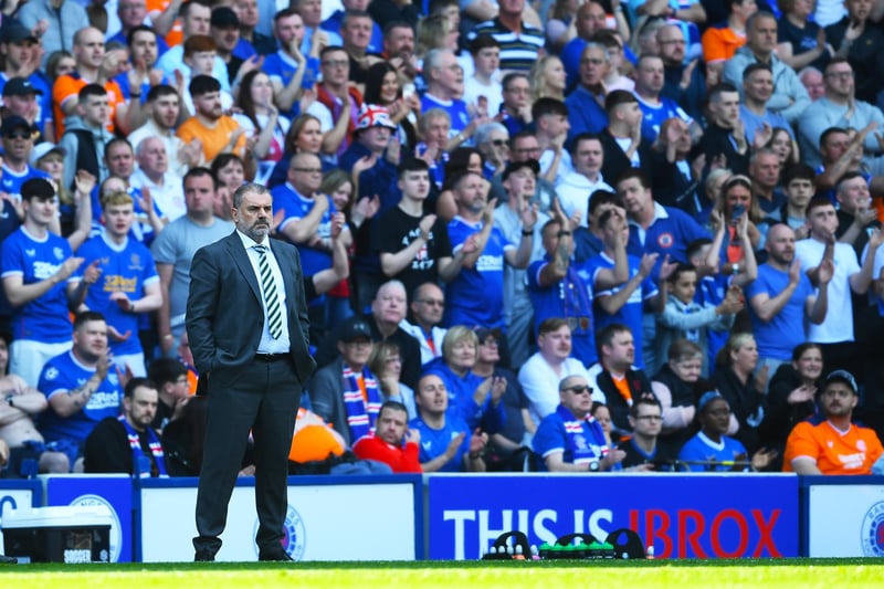 Celtic manager Ange Postecoglou watches on from the dugout at Ibrox as his team slump to a 3-0 defeat to Rangers.