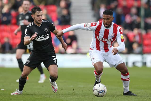 Stoke City's Tyres Campbell and Sheffield United's George Baldock: Barrington Coombs/PA Wire.