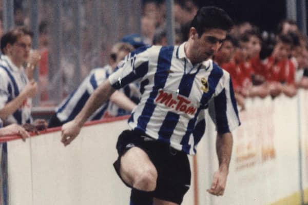 Eric Cantona playing for Sheffield Wednesday in an indoor game in 1992.