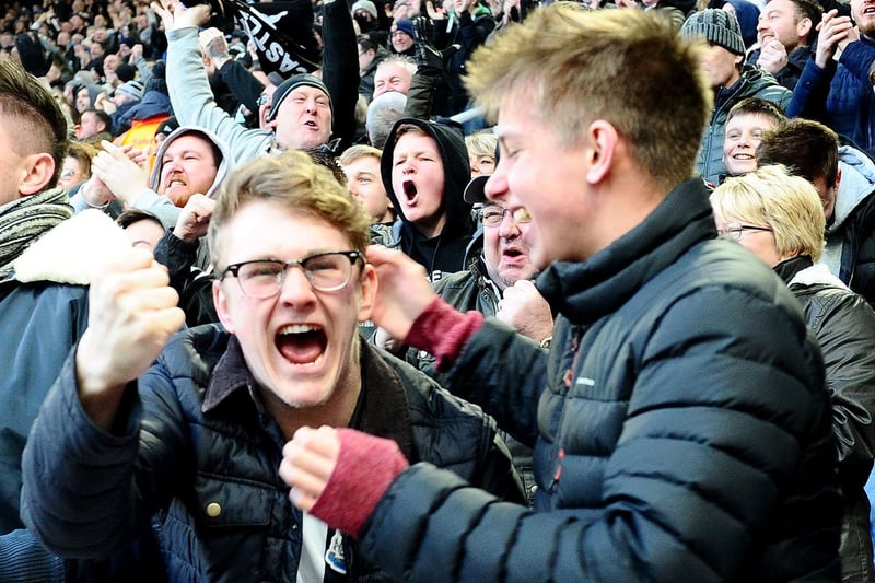 Newcastle United fans celebrate Matt Ritchie's winning goal against Manchester United in 2018.