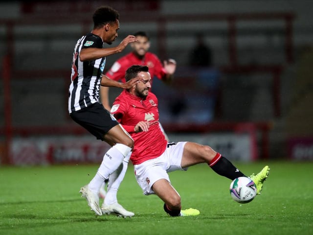 Morecambe stayed within touching distance of the play-off places with a valuable late draw against Scunthorpe United on Saturday Aaron Wildig was the man of the hour, popping up with a late effort to salvage a point for Derek Adams' men. (Photo by Alex Pantling/Getty Images)