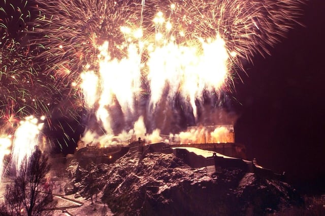 Edinburgh bids farewell to the year 2000 in style with a fireworks display over Edinburgh Castle.