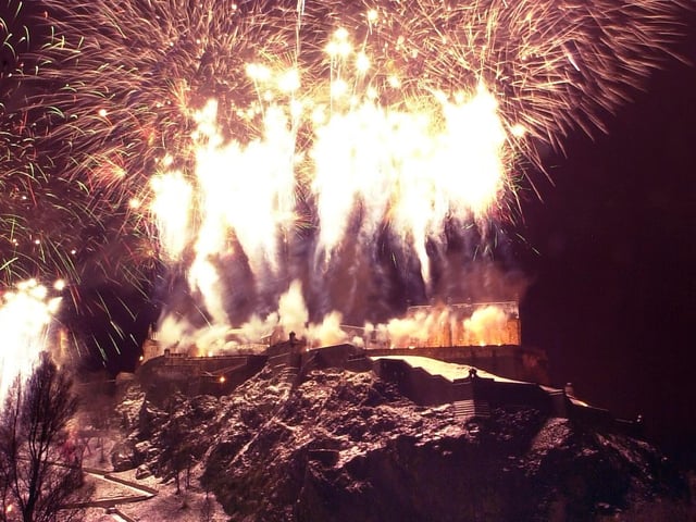 Edinburgh bids farewell to the year 2000 in style with a fireworks display over Edinburgh Castle.