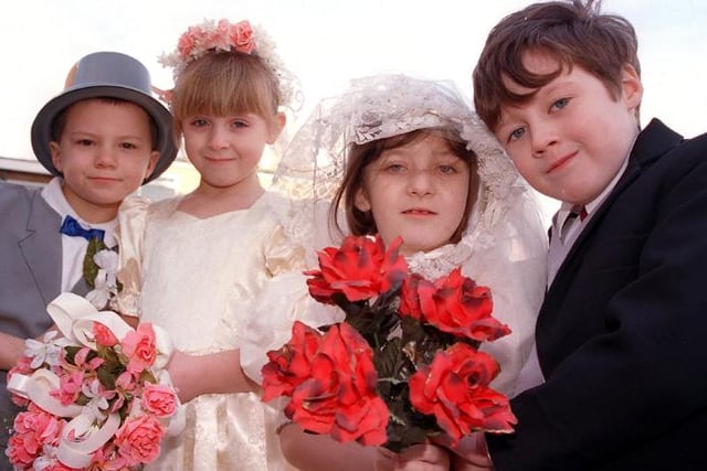 Children dress up for pretend wedding in Townfield Park in 2000.