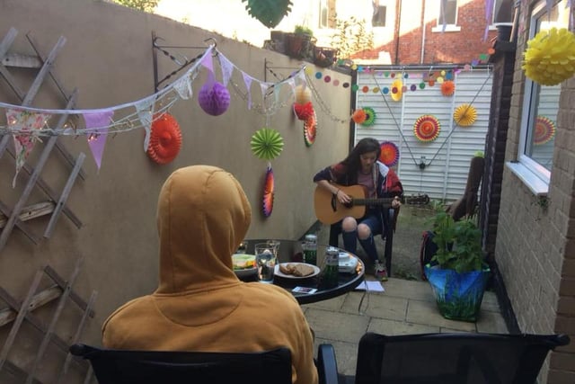 Stephen Sullivan posted: This socially-distanced birthday picture of singer/songwriter Tipps playing at the bottom of our yard. Was a lush and unique, memorable way to celebrate.