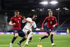 BURNLEY, ENGLAND - NOVEMBER 11: Folarin Balogun of England holds off Michal Fukala of Czech during the UEFA European Under-21 Championship Qualifier match between England U21s and Czech Republic U21s on November 11, 2021 in Burnley, England. (Photo by Lewis Storey/Getty Images)