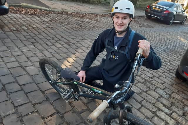 Western Road, Crookes, Sheffield, has seen its surface changed back into cobbles. More Sheffield Streets could follow. Pictured is resident and cyclist James Halliwell.