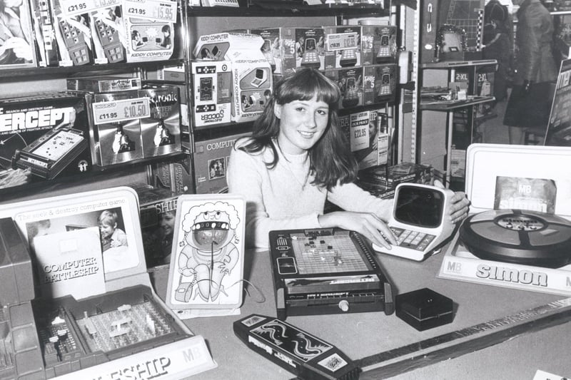 Many readers, looking back to its closure in 1988, wish for family-owned Redgates to make a return. Pictured above is Mandy Nunn alongside some of the toys sold at the store, in November 1979.
