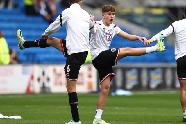 Oliver Arblaster warms up ahead of his full league debut for Sheffield United, at Cardiff City: Darren Staples / Sportimage
