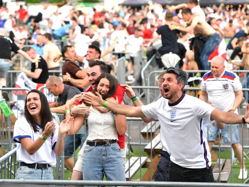 Fans in Manchester are all smiles as England's next match will be played at 8pm on 3 July in Rome, Italy, and will be the first time in the tournament that England have to play a game away from Wembley Stadium (Anthony Devlin/Getty Images)