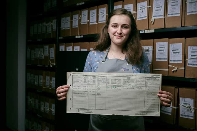 Emily Briffet, a Findmypast conservation technician, holds the 1921 census return for Thomas Moore, better known as Sir Captain Tom, who famously walked 100 laps of his garden during the pandemic and raised £33m for NHS charities. At the time the census was taken Tom was one year old and living in Keighley