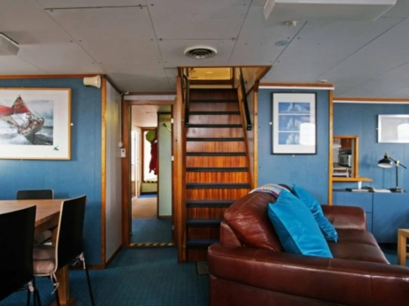 Take the stairs from the deck to discover a comfortable living space for relaxing and eating.