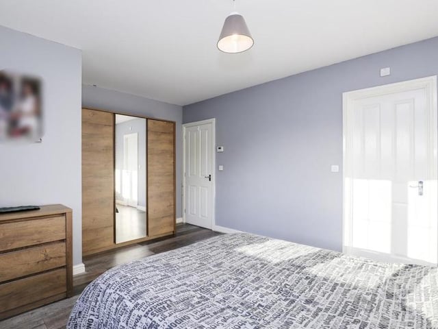 This second photo of the master bedroom at the Tom Stimpson Way property shows there is plenty of room for storage cupboards or wardrobes.