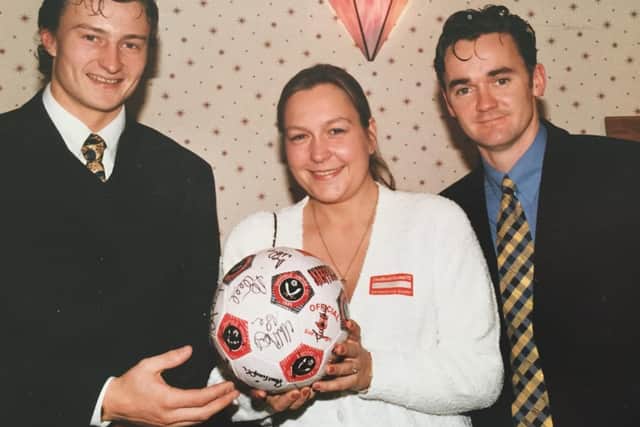 Petr Katchouro (left) still watches all of Sheffield United's games on television at his home in Minsk, the capital city of Belarus