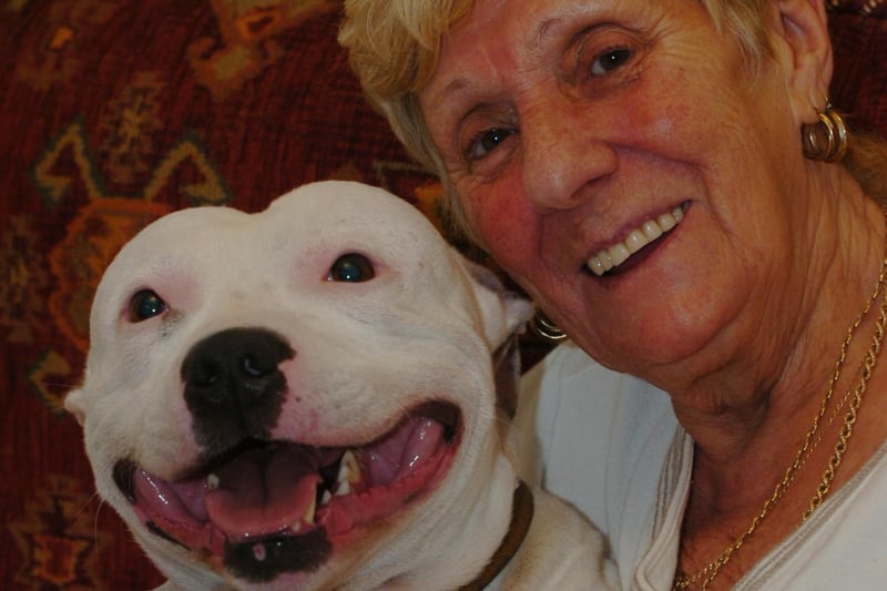 Maureen True, reunited with her dog Charlie, who went missing after a firework was set off next to him in November 2007