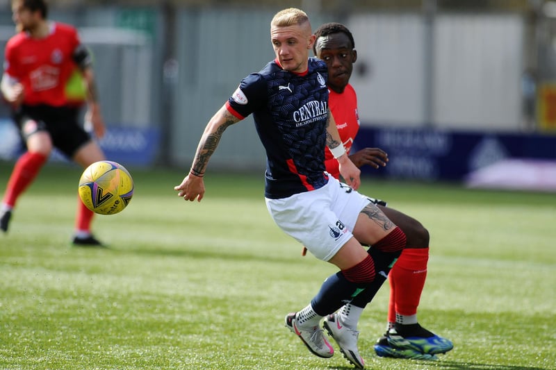 Falkirk's Callumn Morrison and Ewan Otoo of Clyde vie for the ball
