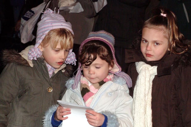 Carol singing at Sutton Christmas light switch-on - do you recognise anyone?