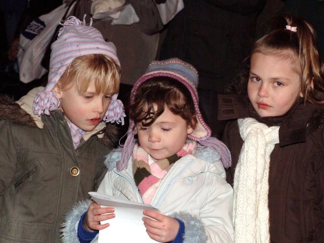 Carol singing at Sutton Christmas light switch-on - do you recognise anyone?