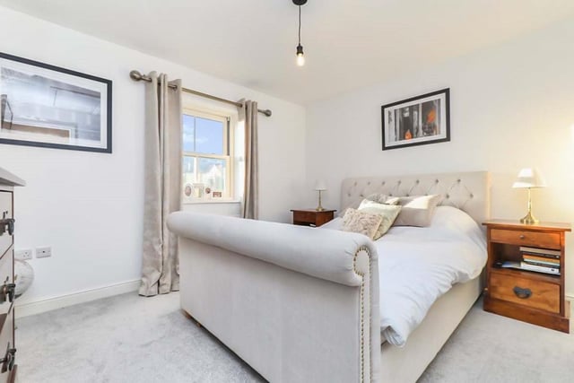 The master bedroom is a double with a carpeted floor and double-glazed window overlooking the front of the house. It boasts a three-piece en suite with walk-in shower, vanity hand wash basin and WC. Partly tiled, the en suite also has a hardwood floor and an extractor fan.
