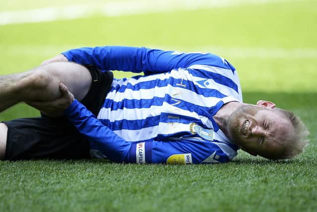 Barry Bannan went down injured late on in Sheffield Wednesday;s win over Portsmouth.