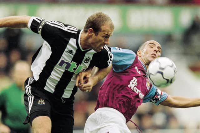 Alan Shearer up against Paolo Di Canio during his time at West Ham United. (Jamie McDonald /Allsport)