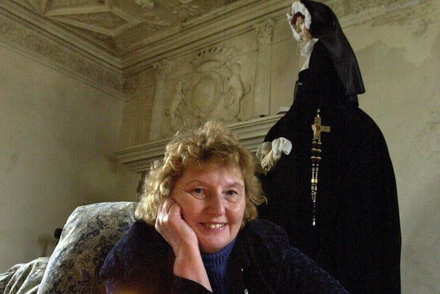 The Lord Mayor of Sheffield Coun Pat Midgley,  during her sponsored sleep over in the haunted Sheffield Manor Castle for charity in 2000, in the background is statue of Mary Queen of Scots who was imprisoned there