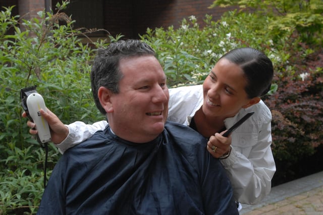 Hairdresser Gill Gibson is pictured shaving the head of PC Bryn Jones in 2008 but who can tell us more about the event?