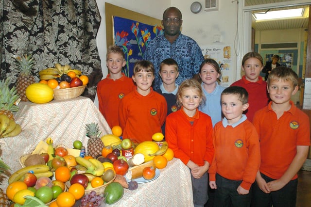 Pictured at Angram Bank school,  Kinsey Road, High Green, where Rev Hlabera Chirwa from Zambia lead the harvest festival service celebrating cultural diversity. Seen are members of the school council  with the Rev  at the service back in 2005