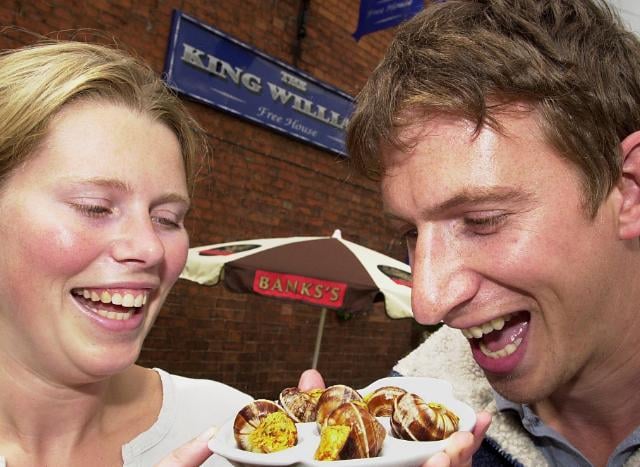 Snails are on the menu for farmer John Durdy back in 2001 at the The King William Pub. Samantha Burnell also photographed.