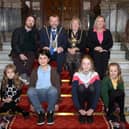 Top row left to right: Artist Alan Pennington, Lord Mayor, Councillor Colin Ross, Lady Mayoress, Susan Ross, Graysons partner Caroline Murray line up with this year’s winners.