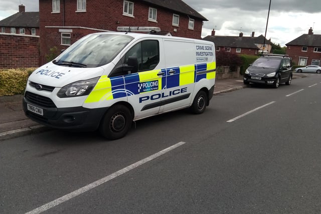 Police crime scene investigation van at on Ravenscroft Place, Sheffield