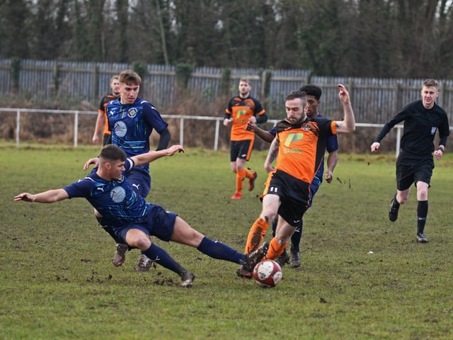 Scawthorpe’s Sam Corner tries to evade a tackle during his side’s FA Sunday Cup win over Westwood Park from Bradford.
