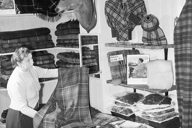Tourist shops on the Royal Mile are nothing new. This picture of Hunting Fraser stole and tartan good shop, on the Canongate, was taken in November 1957.
