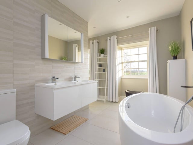 The property benefits from three bathrooms