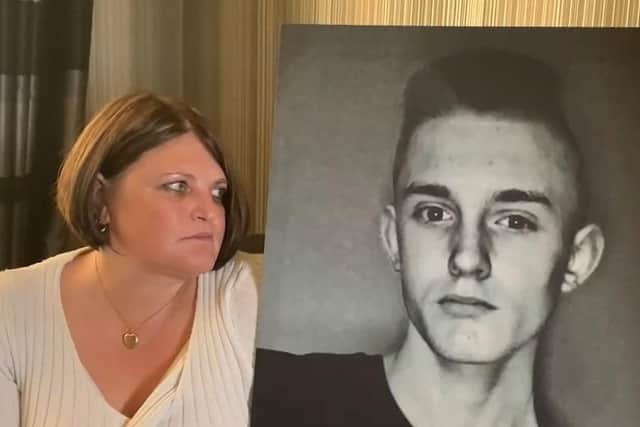 Lisa Theobald with a picture of her son Ryan.