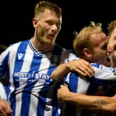 Sheffield Wednesday captain Barry Bannan (centre) is looking forward to the Owls' trip to Wembley.